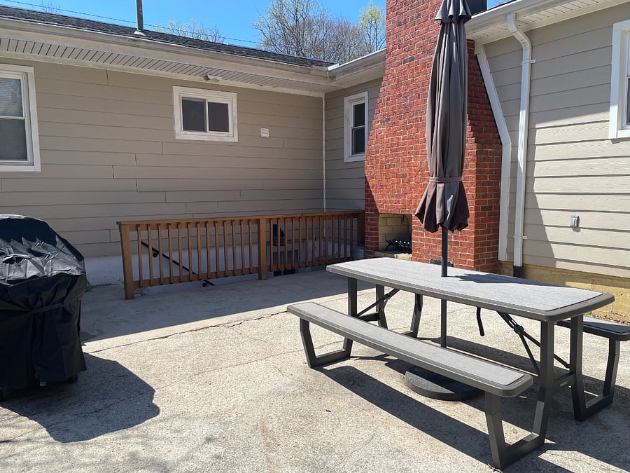 Step out to the outdoor patio just beyond the entry stairwell.