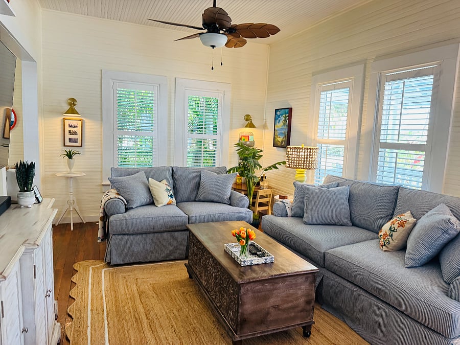 Large and comfortable living room with new furnishings and vintage touches throughout.  New furnishings and queen sleeper sofa.