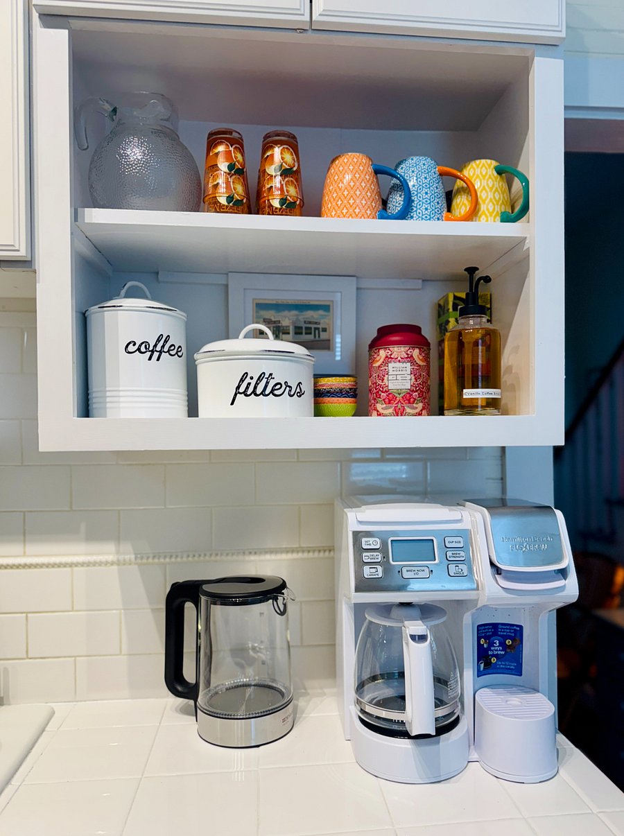 Coffee and tea station stocked with all you need for your morning cup of java or afternoon tea.