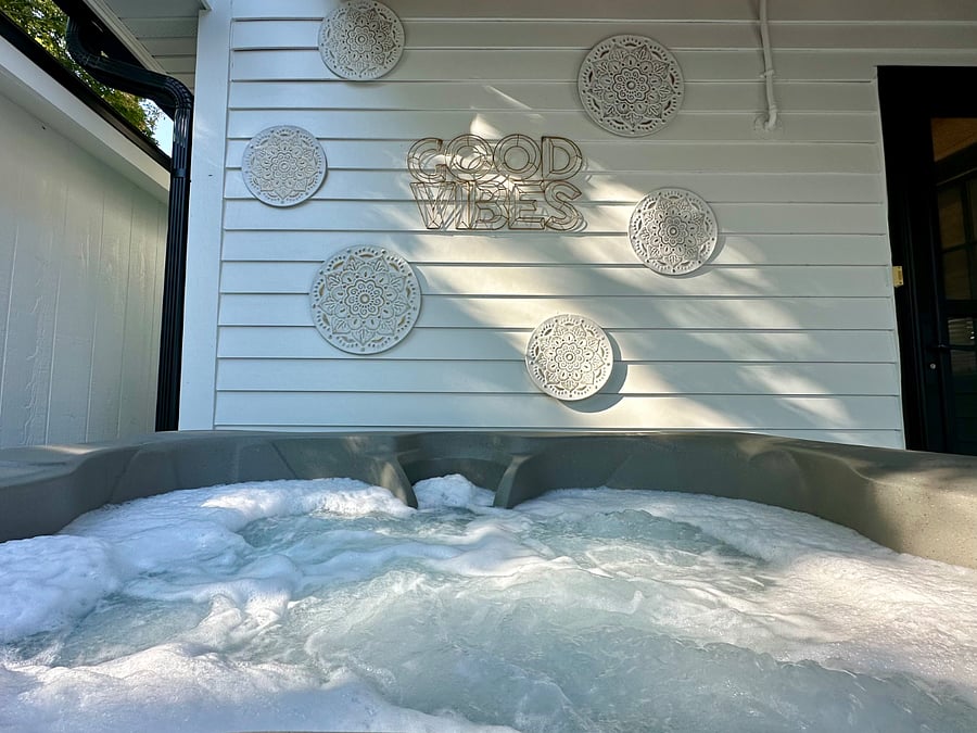 Soak in the private hot tub all to yourself after a long day.