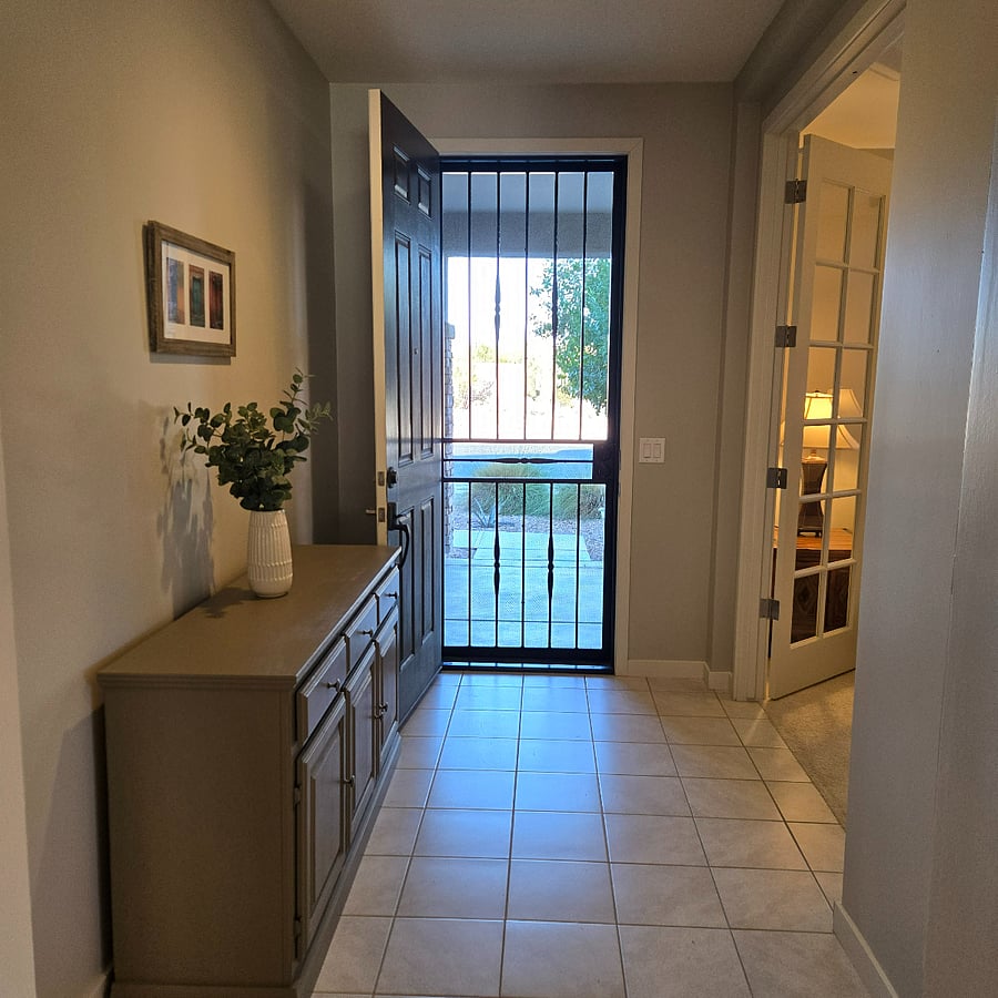 There is a sturdy screen door at the entry, to allow air flow on cooler days, and allow your pet or kids to look outside safely and with ease!