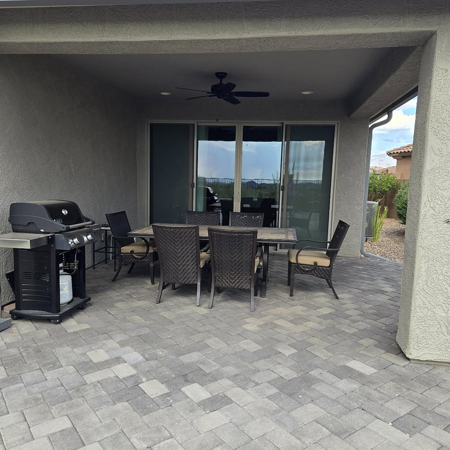 Covered patio with table and chairs to relax and enjoy the views while you dine alfresco!