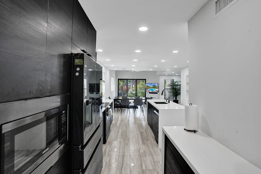 Galley style fully equipped gourmet kitchen.