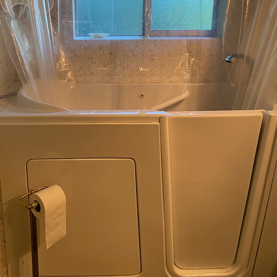 Walk in jetted tub with shower