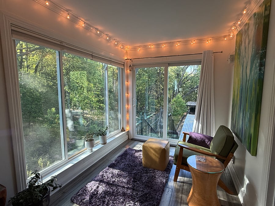 The sunroom looks out into the preserve. A backyard of trails and wildlife.