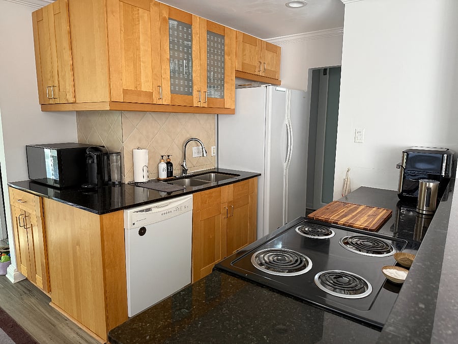 Full kitchen with all accessories, utensils, pots and pans and more.