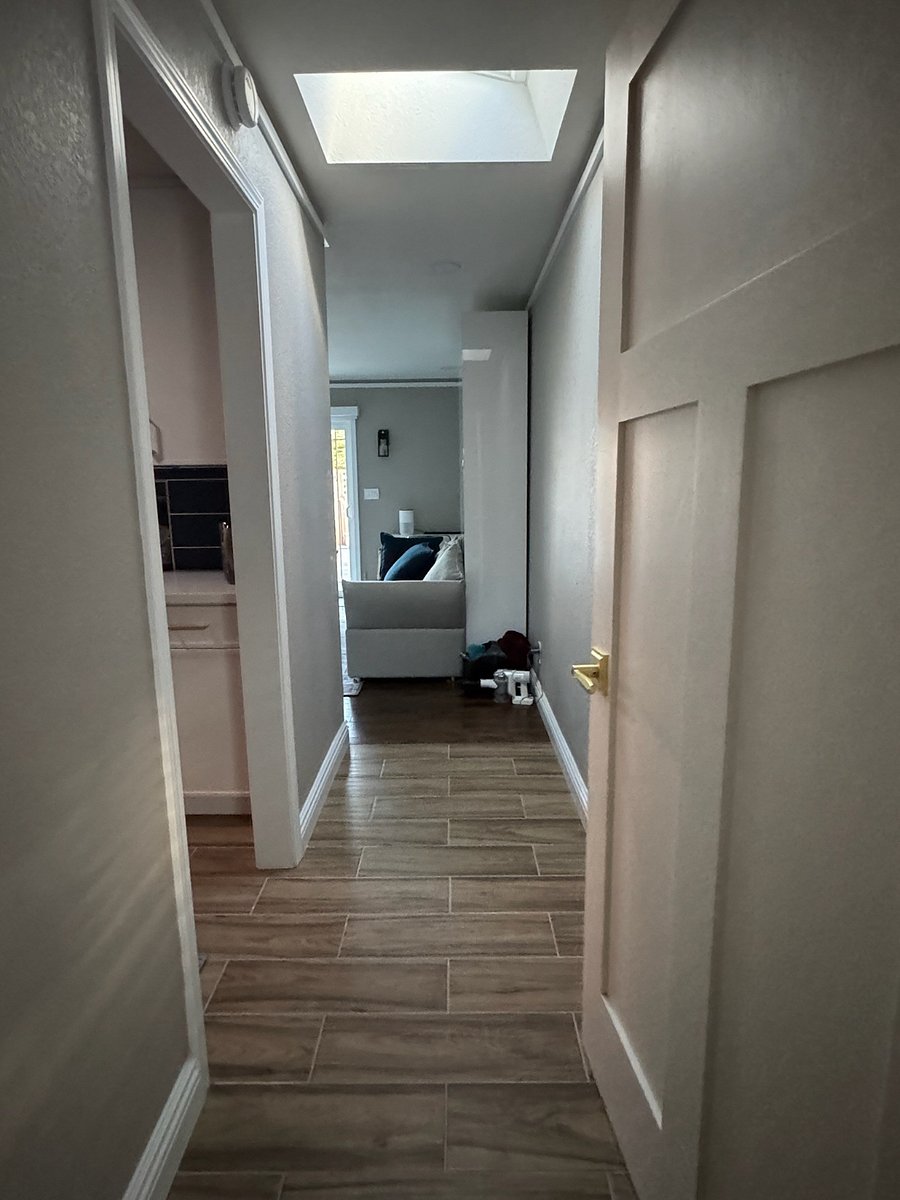 First walk in/entry, kitchen on left