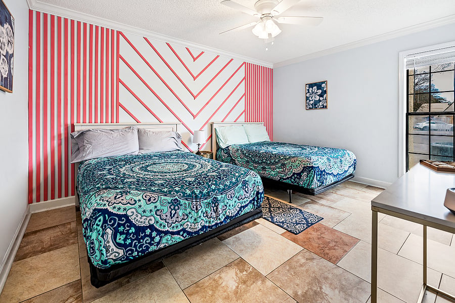 This is the second bedroom, located downstairs. The beds were purchased earlier this year. They are double sized beds.