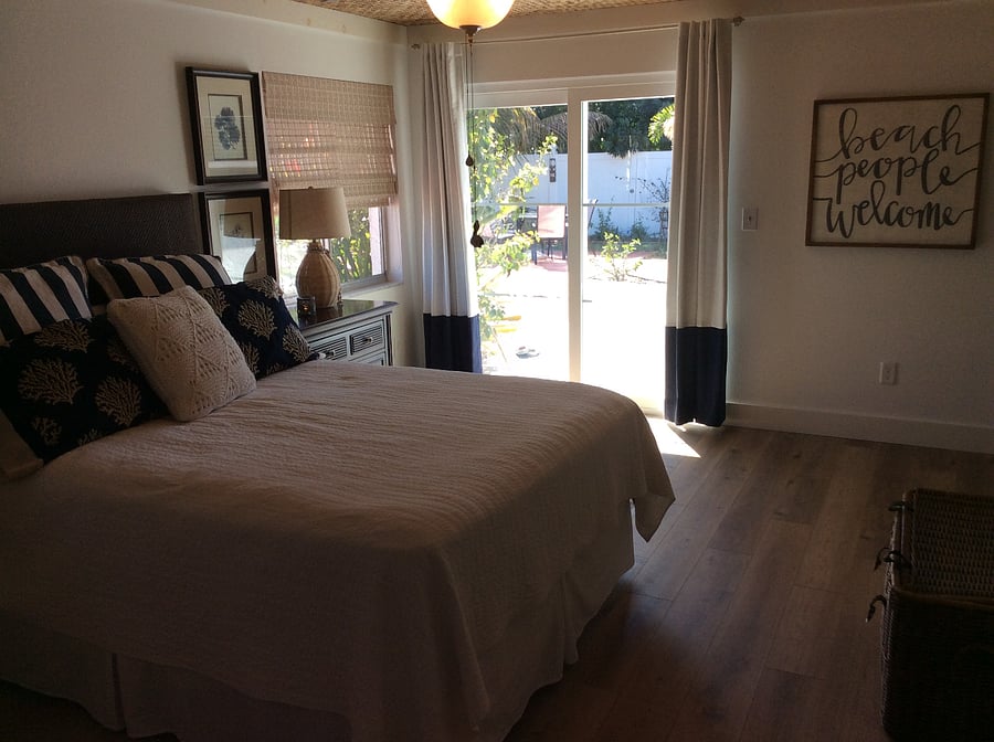 Primary Bedroom with Patio Door to Pool