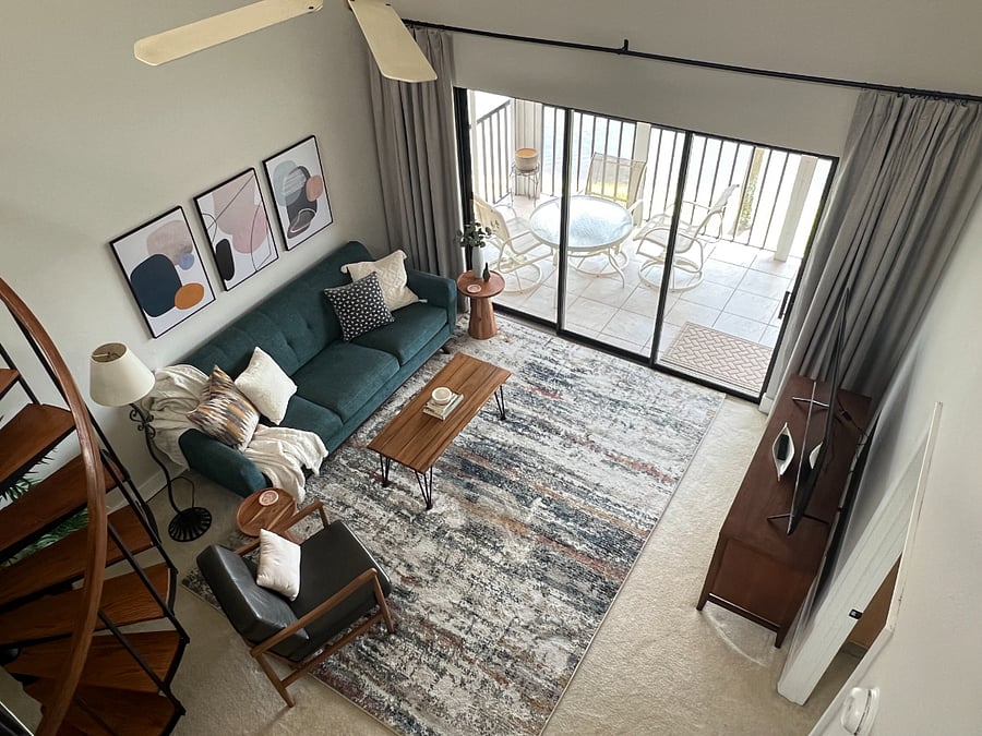 Triple door sliders provide lots of natural light, and the blackout curtains keep it out when needed!