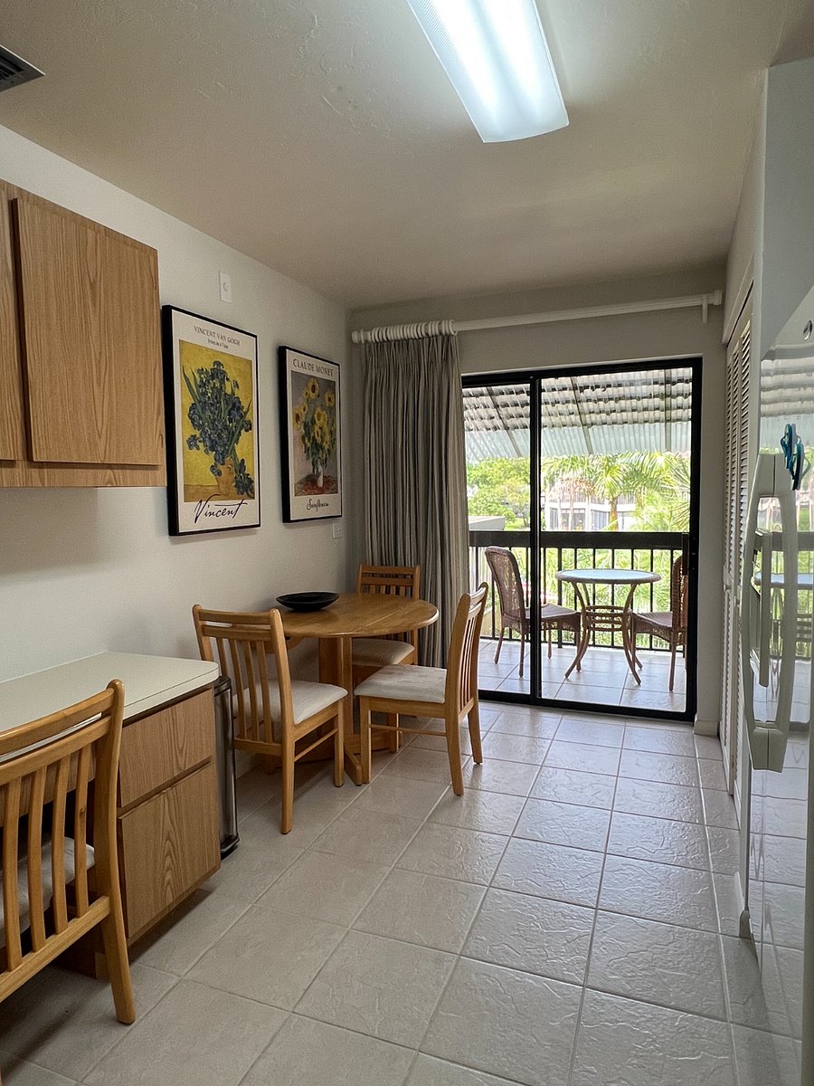 Eat-in kitchen plus sliders to the front lanai - a perfect place for your morning coffee