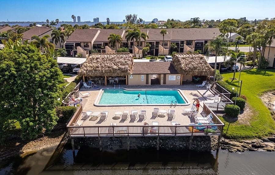 The pool is located just steps away from the condo