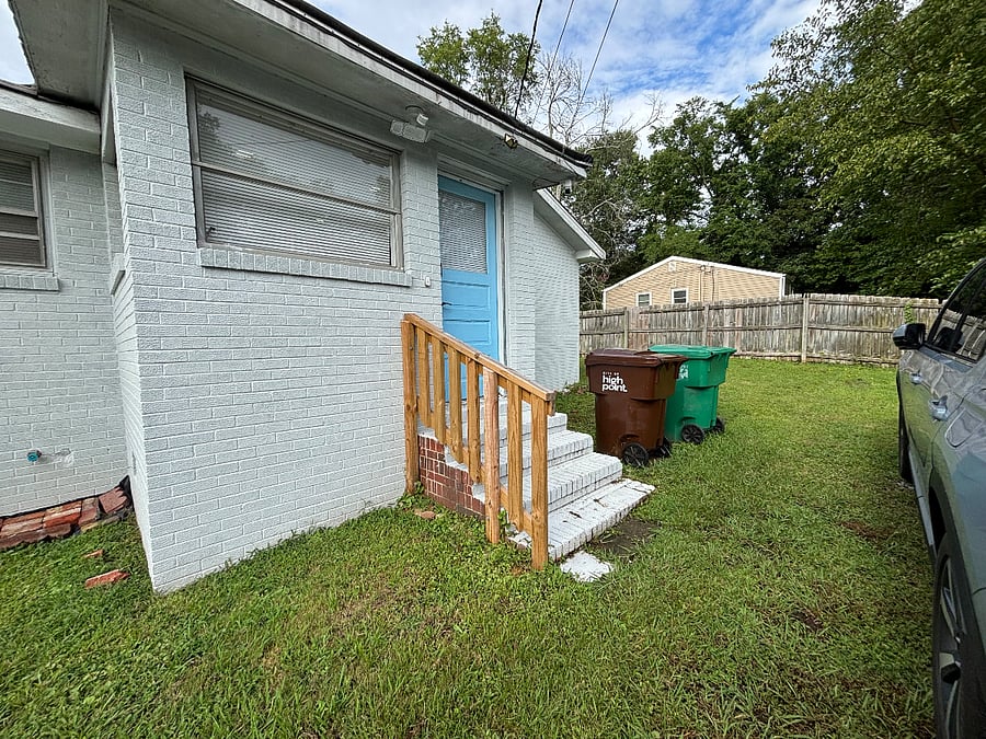 Back of the house: Driveway and Main Entrance