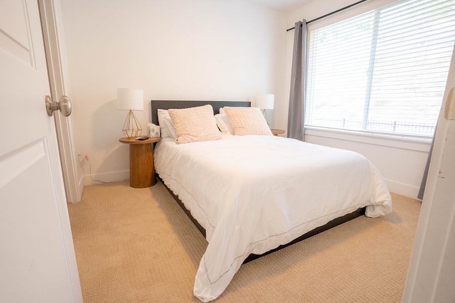 bedroom with full bed and tv