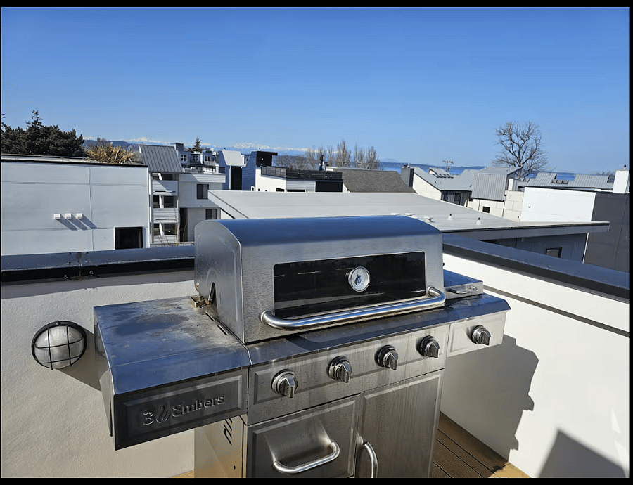 Outdoor grill with main line connection
