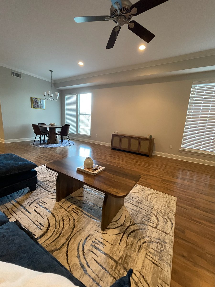 Living Room with Dinner Table in corner and TV stand (Smart TV will be added before start of lease contract).