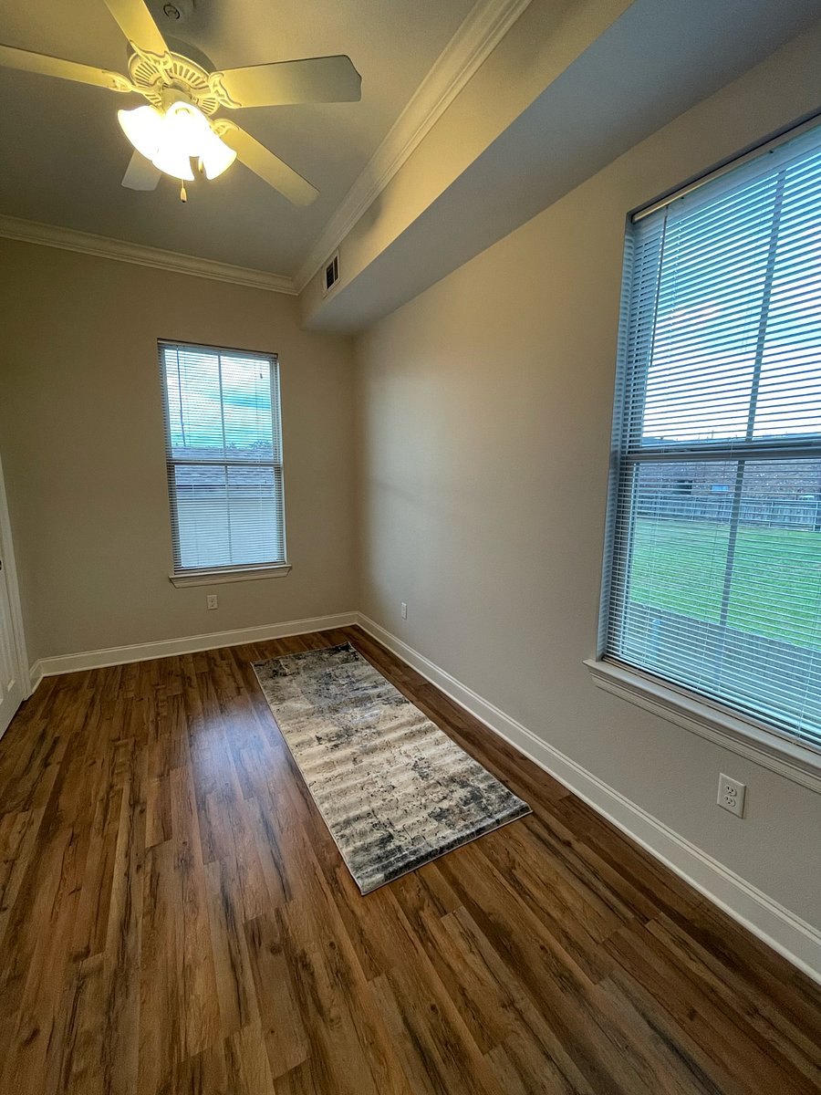 The office. This room will feature a chair and desk for comfortable, remote-work capabilities. The room includes its own closet space. Behind the office door is the circuit breaker box.