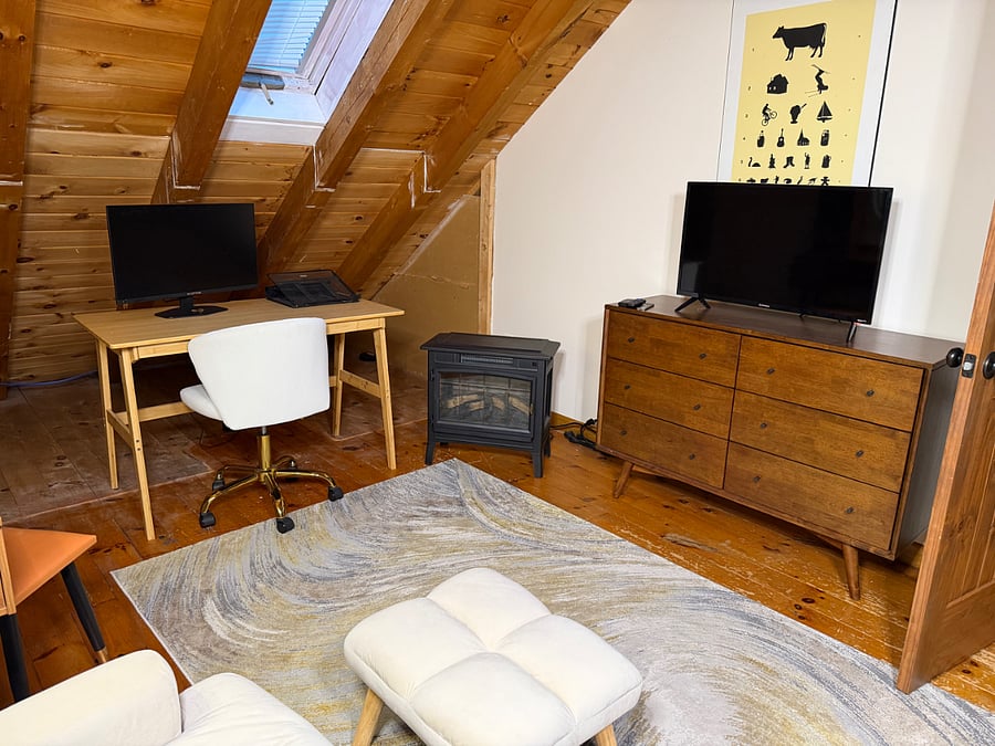 Desk with second monitor, electric fireplace, RokuTV with AppleTV