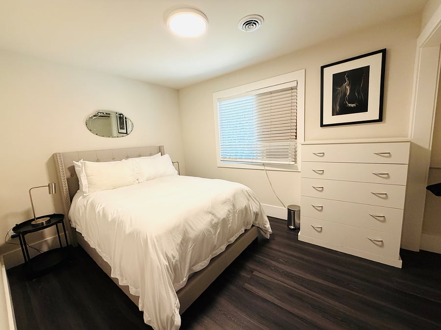 Bedroom 2 with window ac unit during summer months