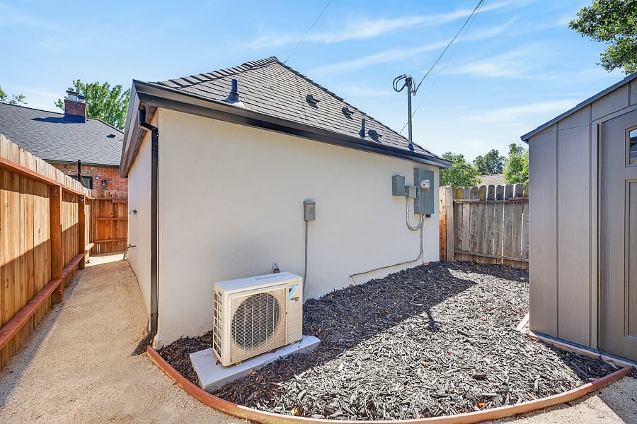 Private enclosed yard with walkway to the backyard