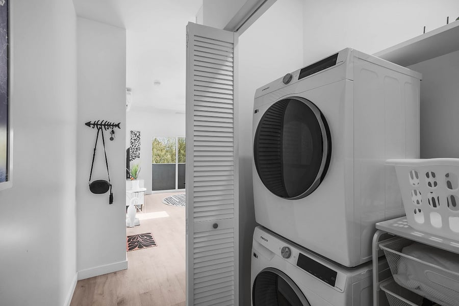 Washer and dryer with space for extra storage.