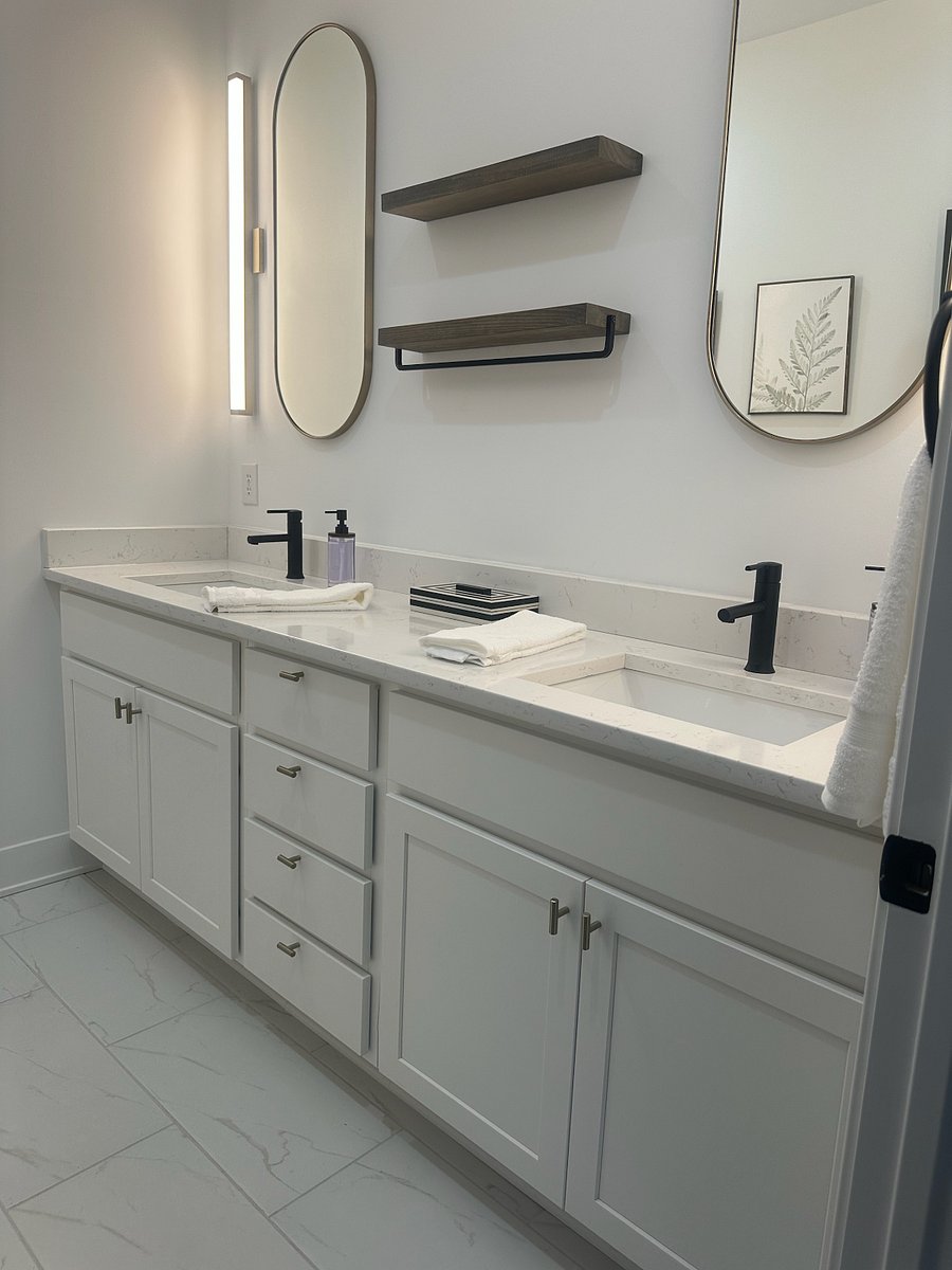 Second bathroom is upstairs next to the other bedrooms; it has a double sink thats newly renovated.