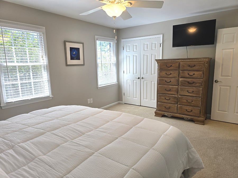 Primary Bedroom - Dresser, TV and Closet