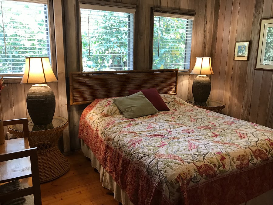 Second bedroom with Queen bed, chest of drawers and attached bath