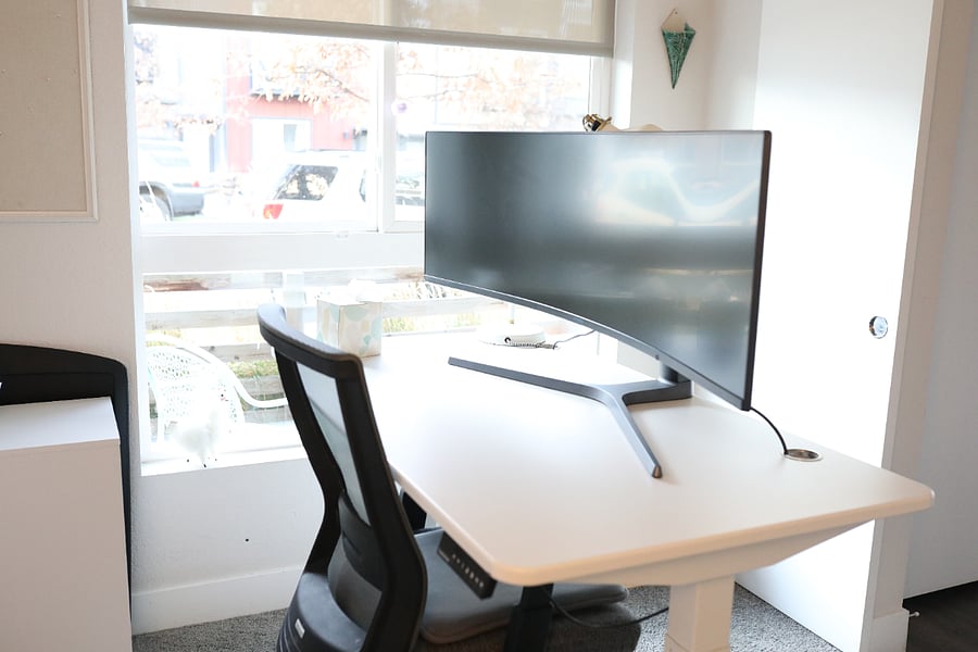 First floor office with Samsung curved monitor