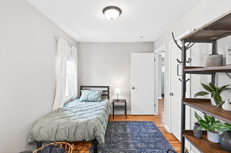 Twin bedroom main level, walk through to master bedroom.