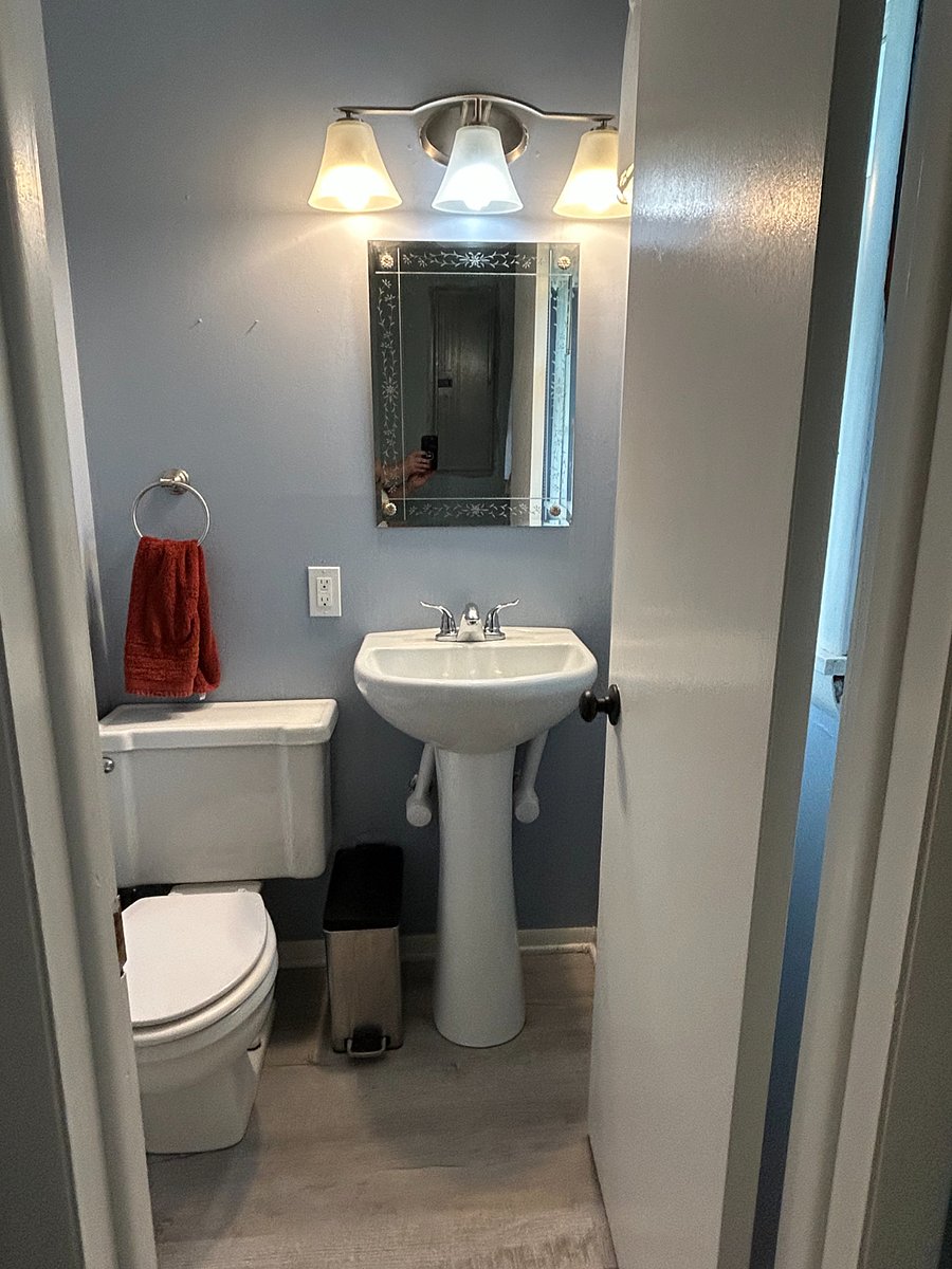 Half Bath off the backyard access doorPorch