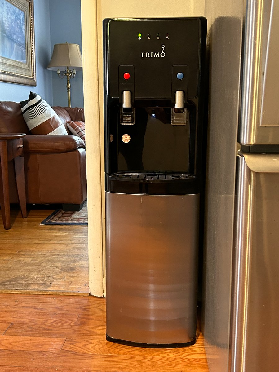 Bottled Water Cooler with hot and cold water.