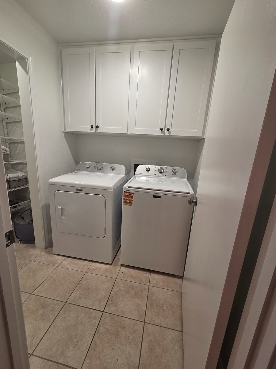 Laundry room with washer and dryer