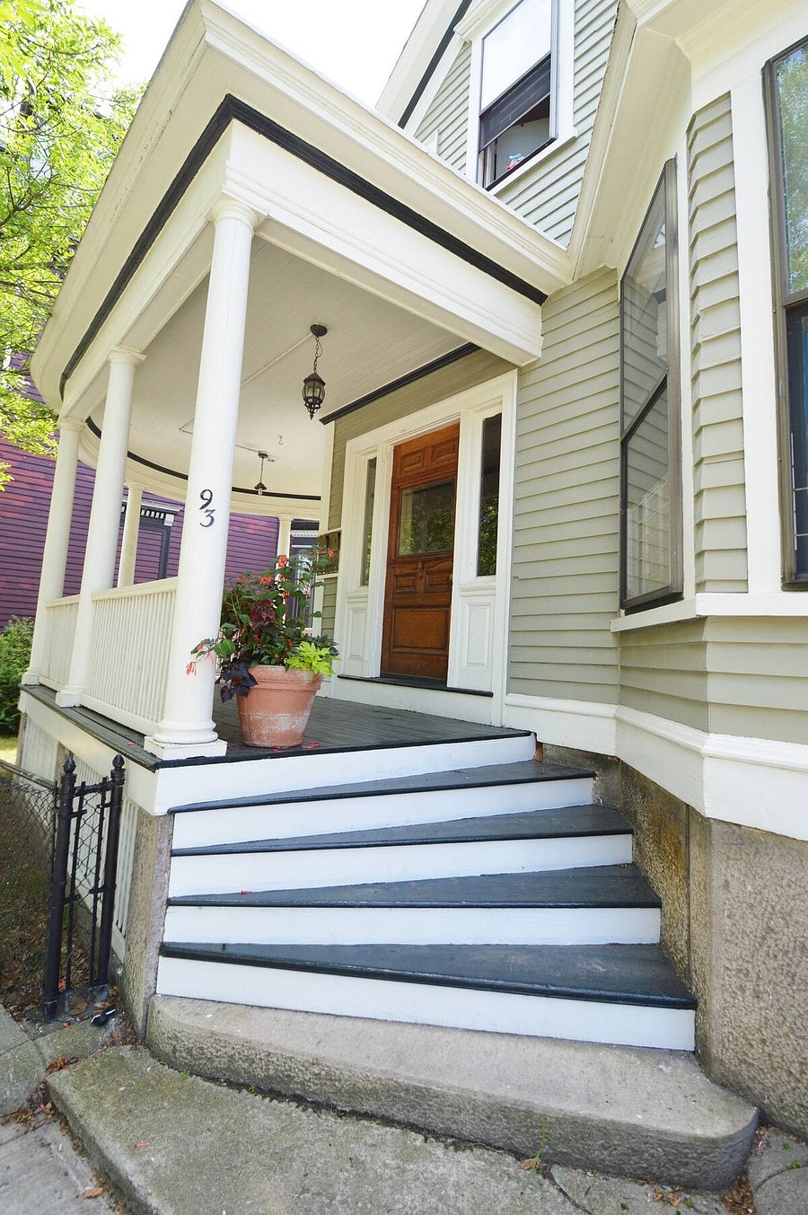 Front entry overlooks the park and is along exclusive Parade Street, where gorgeous Victorian homes line the street