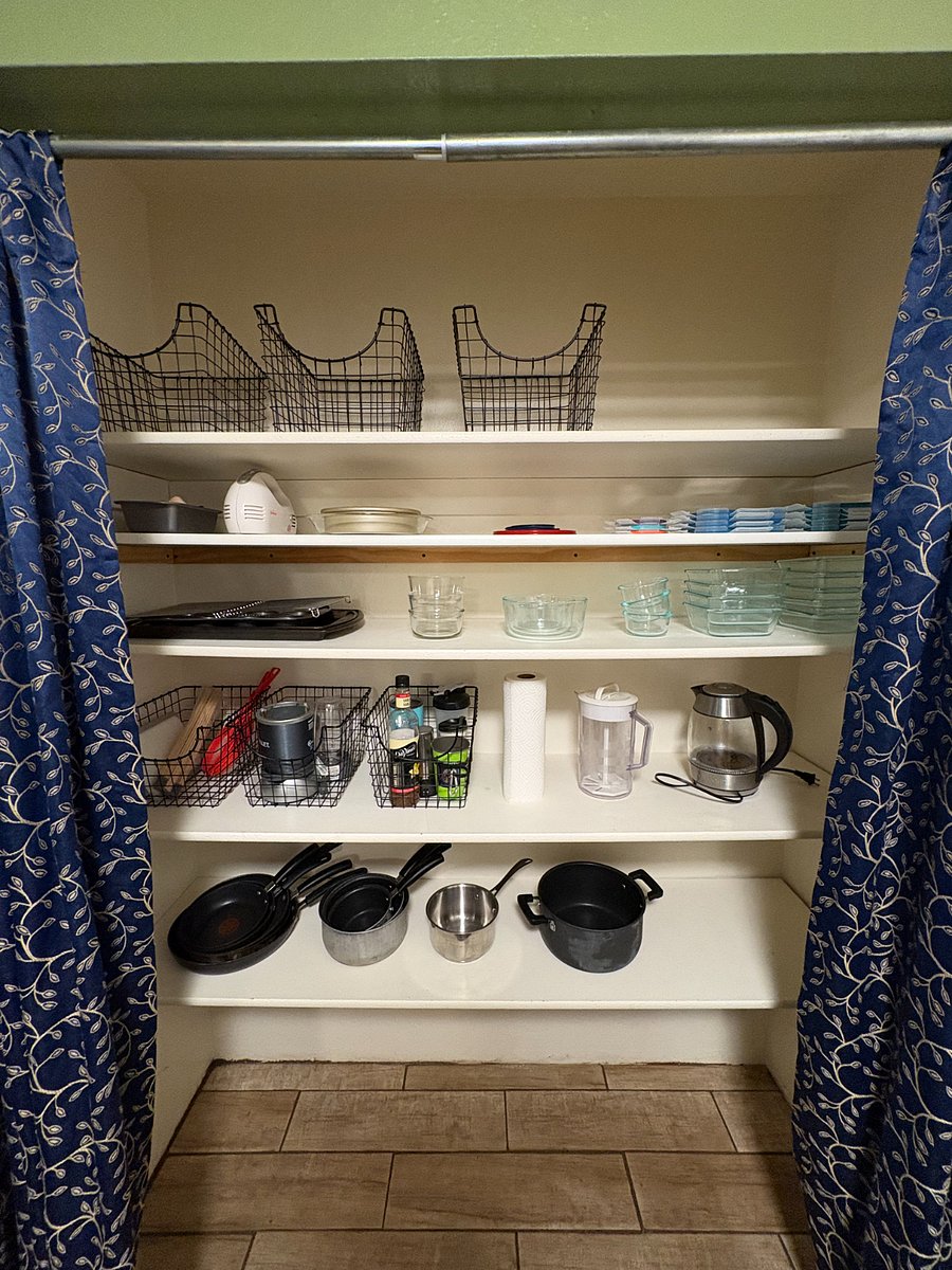 Kitchen Pantry: Comes with glass food storage containers, hand-held mixer, various baking supplies, a magic bullet and more.