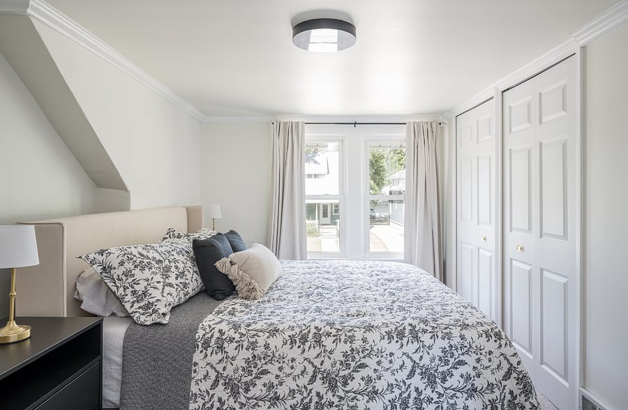 King bed in Master Bedroom - upstairs. Oversized nightstands with spacious drawers and side-by-side closets