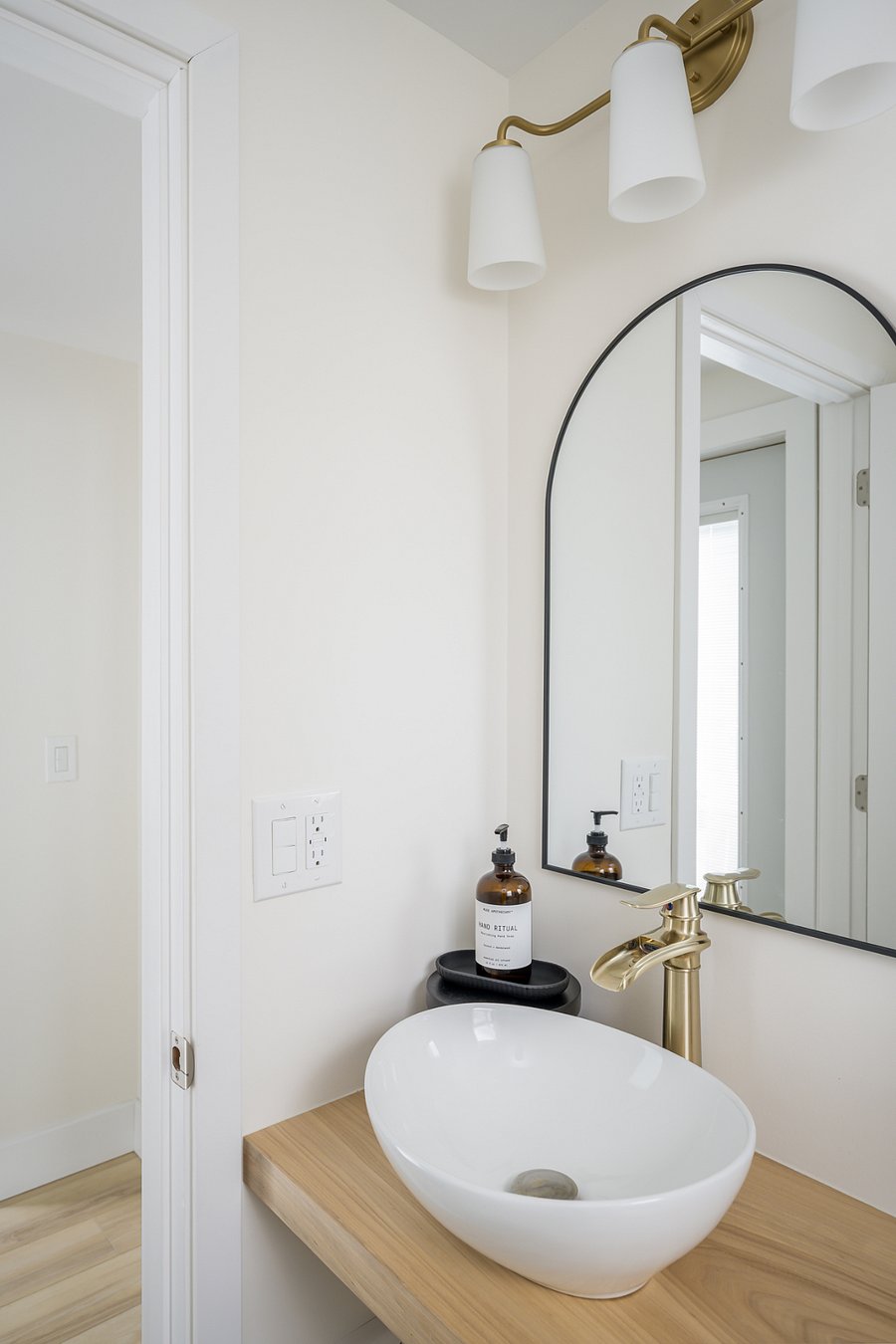 Half bathroom downstairs - just off the bedroom