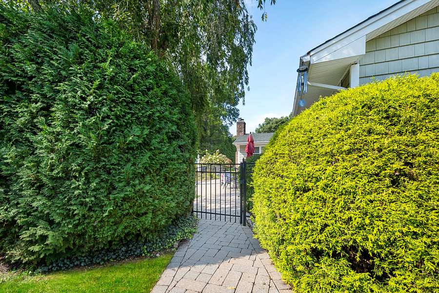 Entrance through gate from parking spot