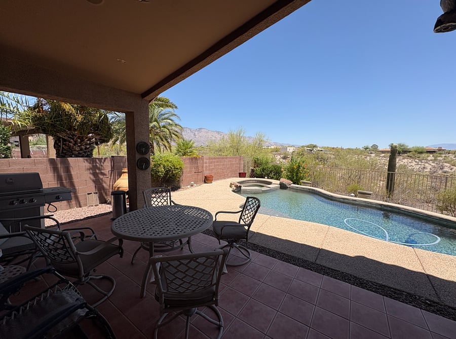 Stunning pool, hot tub, and mountain views