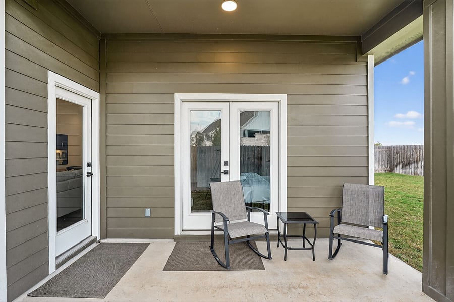 Covered Backyard Porch Seating Area
