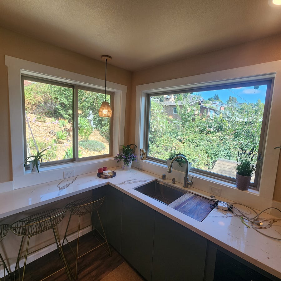 Large stainless sink with drainer and chopping board