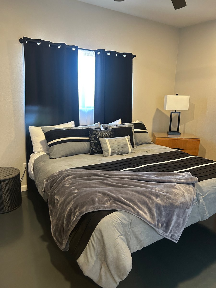Primary bedroom with sliding door to back patio