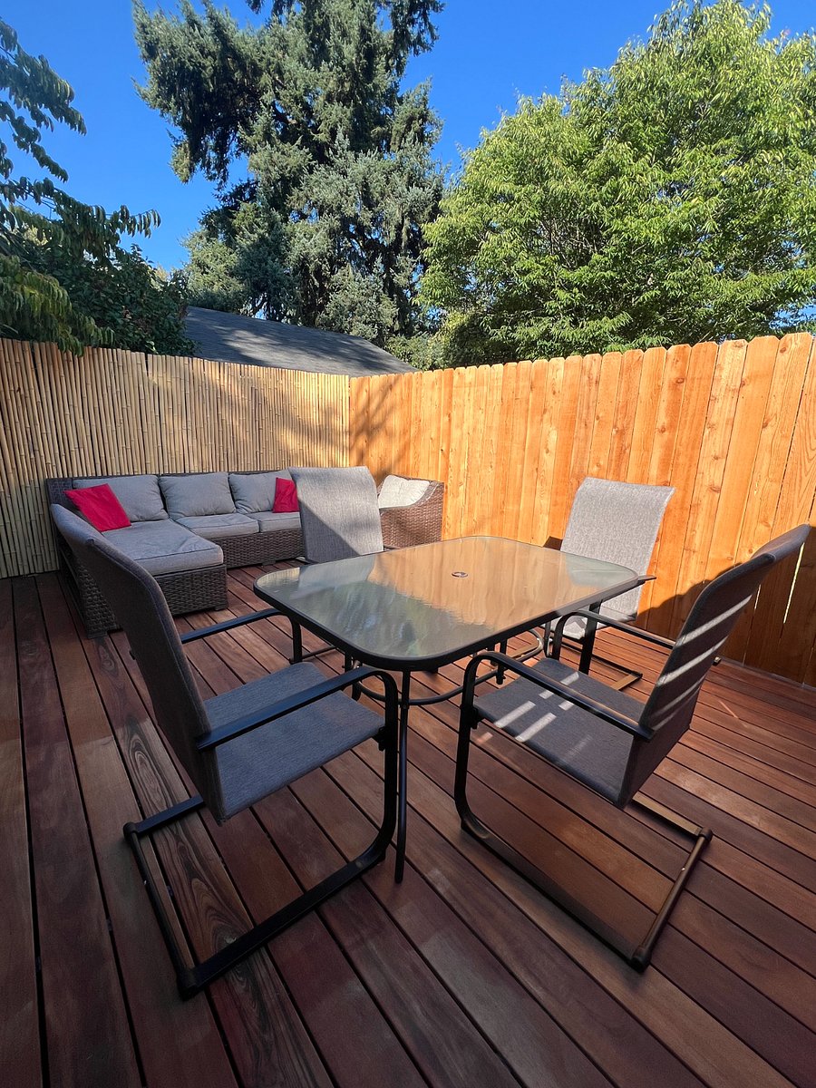 Private deck with outdoor seating and dining area