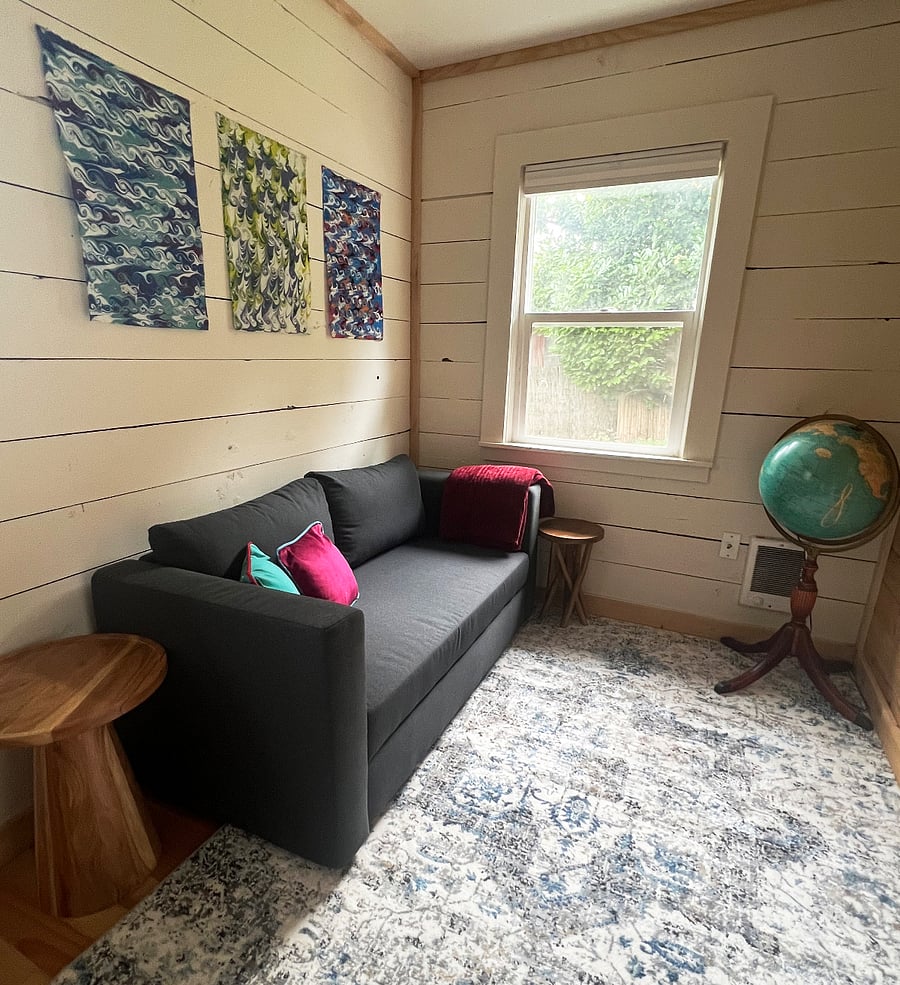 Bonus room with loveseat that converts to a twin bed