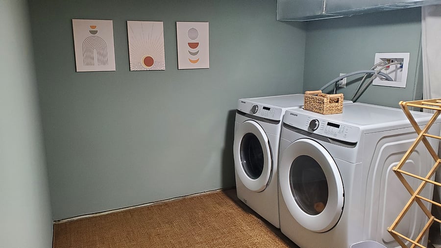 Laundry in basement. Short ceilings here but new Samsung washer and dryer!