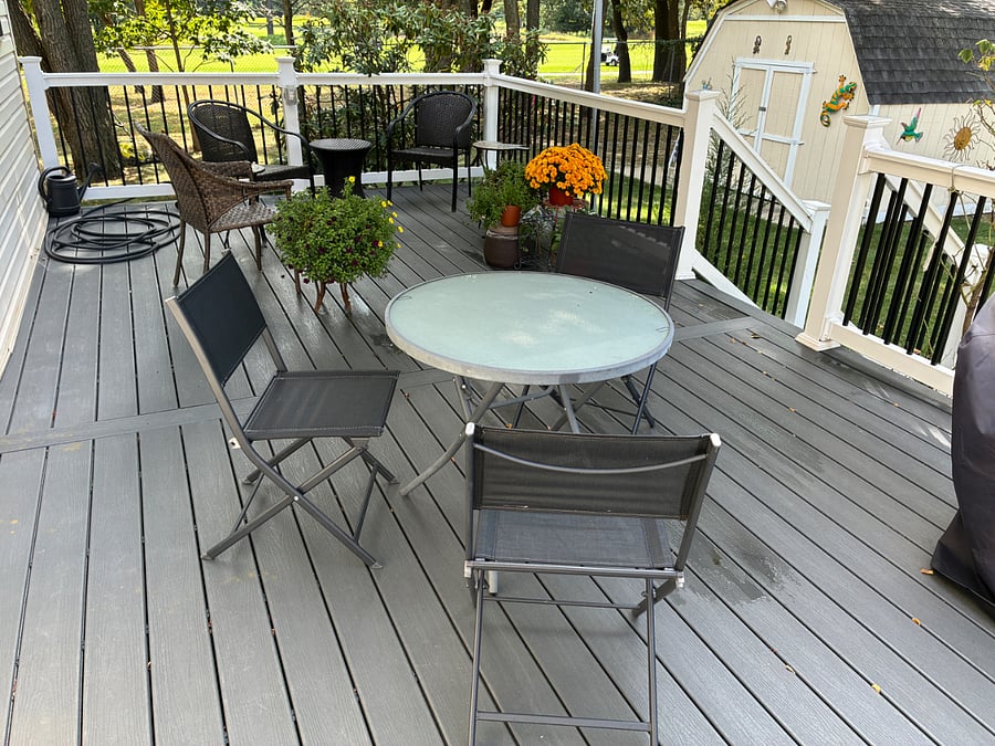 Large deck with seating and view of golf course