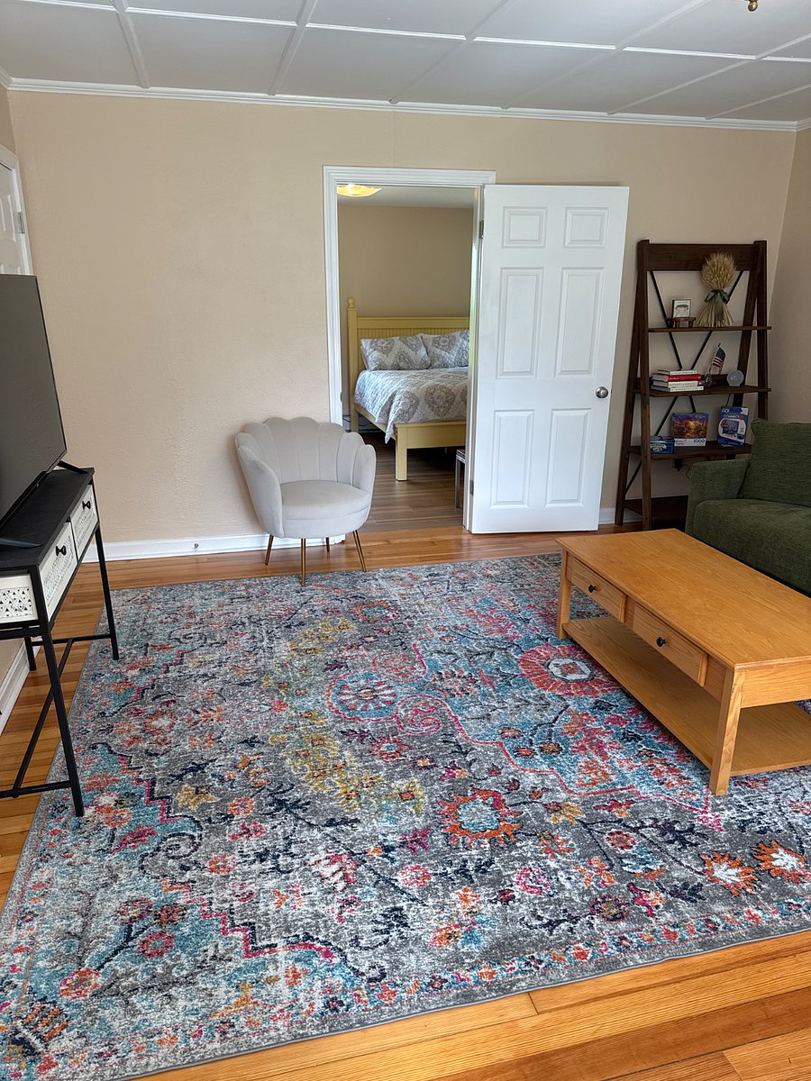 Living room with smart TV and new furniture 