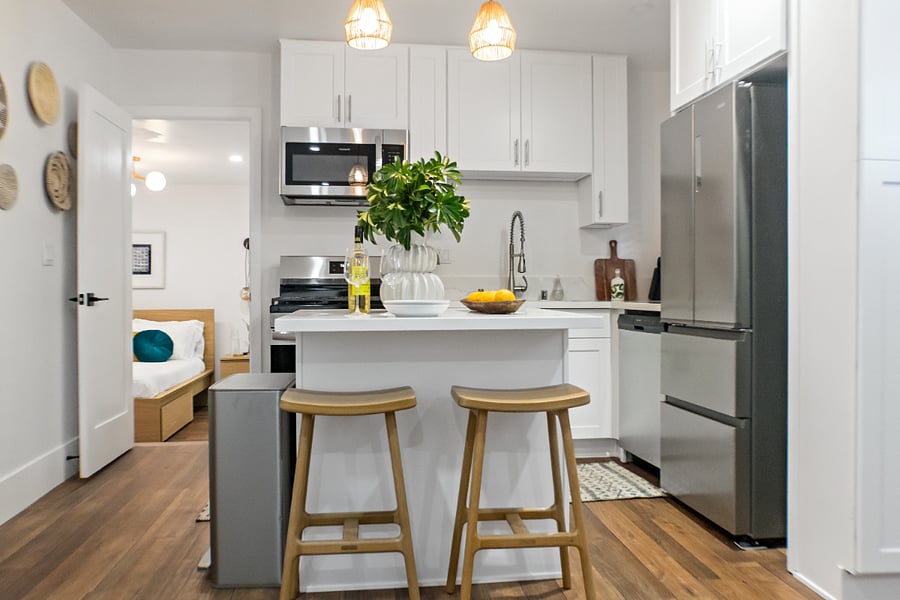 Step into our brand new, fully equipped kitchen with sleek new appliances and beautiful new countertops!