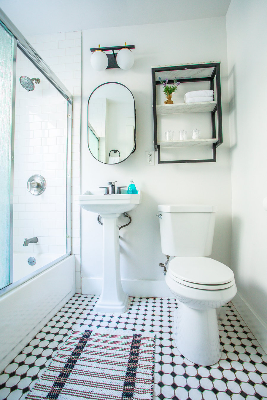 Stocked bathroom with body wash, shampoo, conditioner and hand soap.