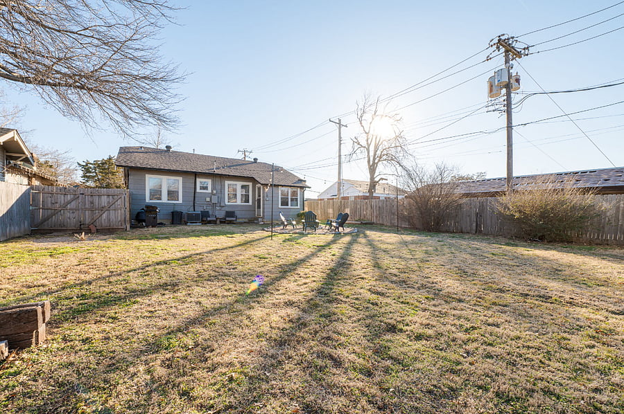 Large, Fully Fenced Backyard - Perfect for your pups to roam and play!